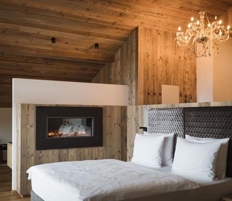 Suite Fireside with Fireplace and Chandelier